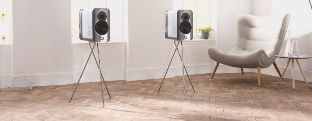 Q Acoustics Concept 300 Gloss Silver And Ebony Bookshelf Speakers Lifestyle Photograph