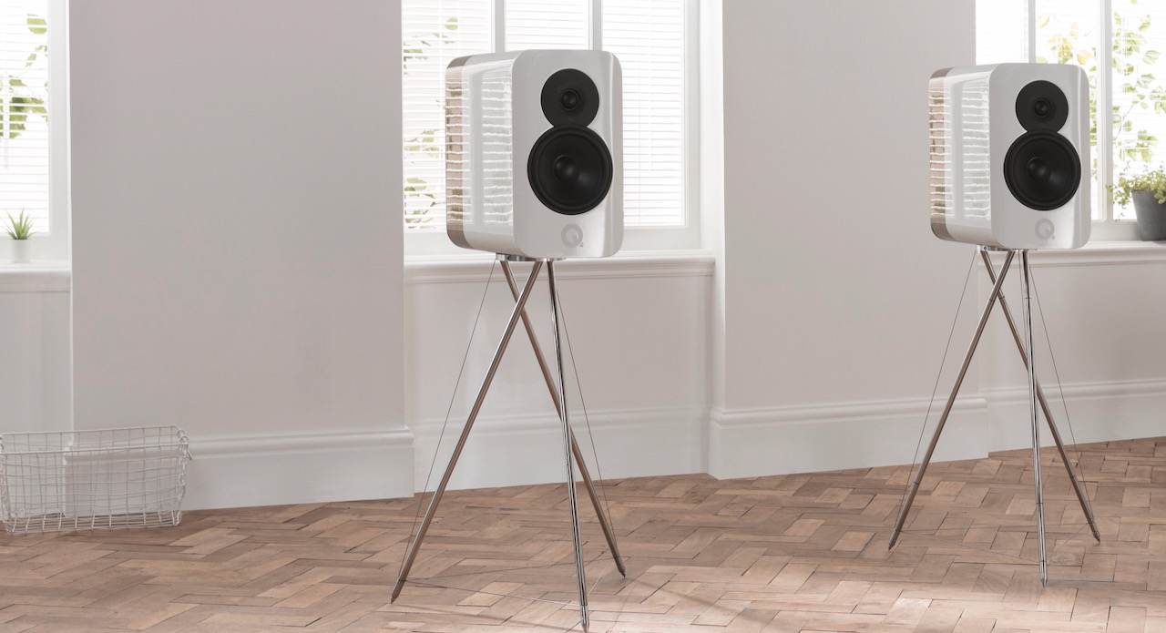 Q Acoustics Concept 300 White Oak On Stands Without Grille Off Lifestyle On Tensegrity Stand